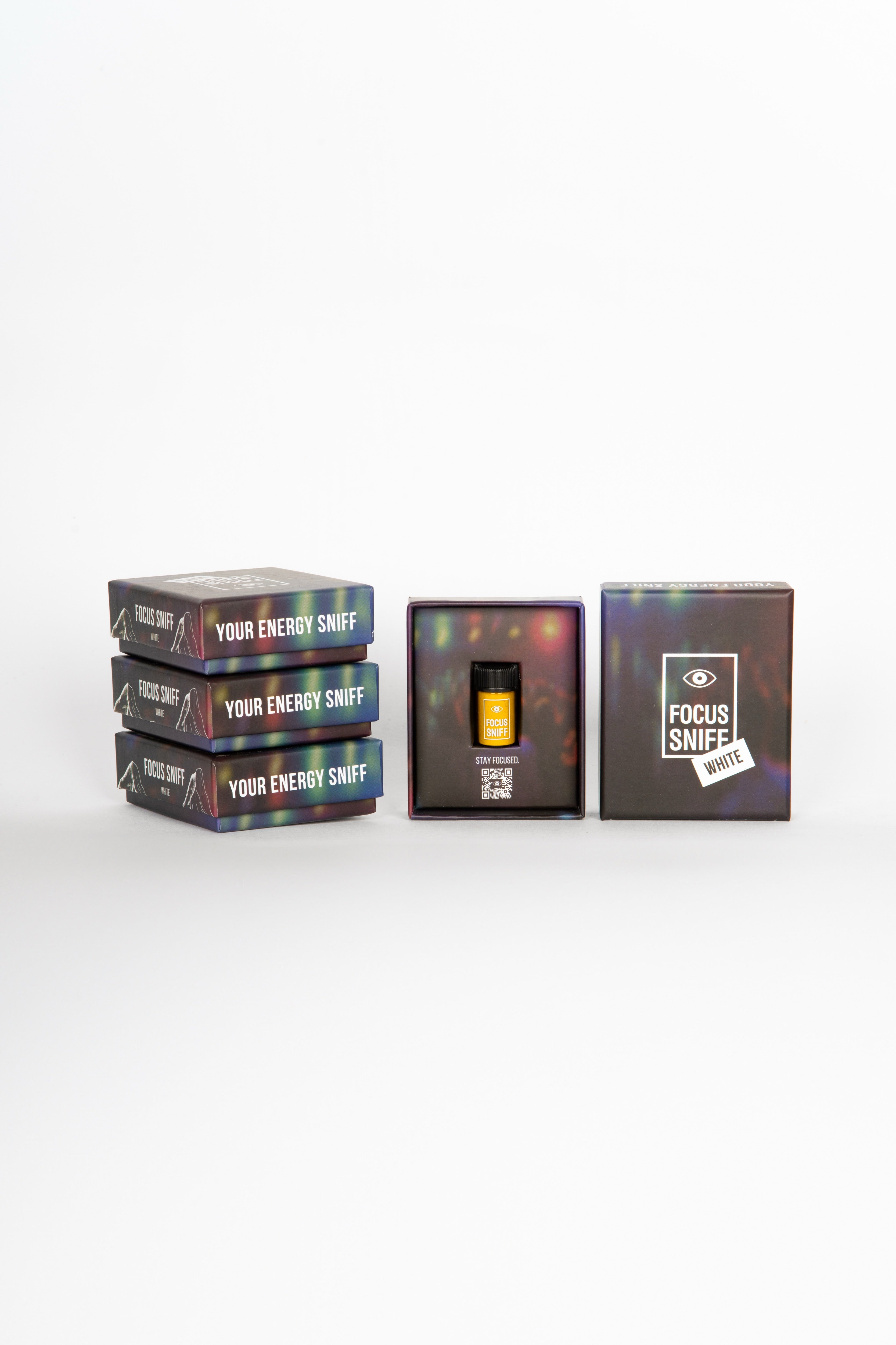 Focus Sniff White luxuriöse Geschenkbox mit holographischem Design und gelber Produktflasche